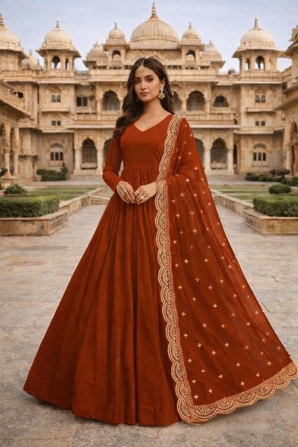 Rust georgette anarkali gown with sequin star dupatta – front view