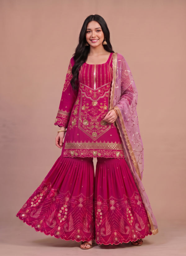 Rani pink sindoor silk sharara suit with gold sequin yoke and embroidered sharara – front view
