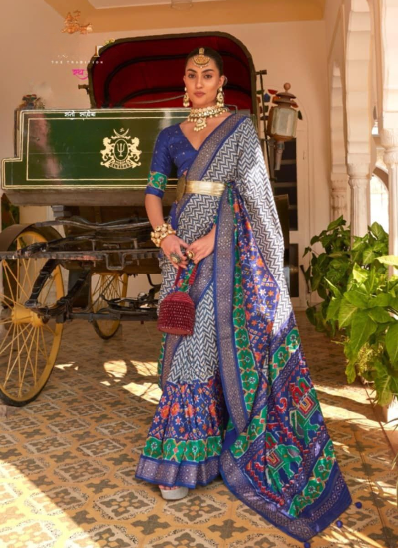 Blue-Green Patoka Saree – Silver Border & Elephant Pallu