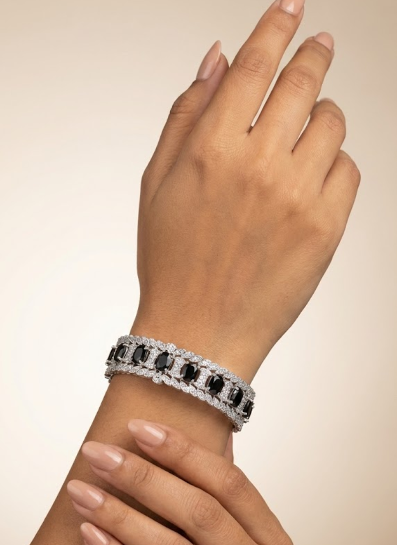 Diamond cut stone bracelet for women with white and black accents, bridal jewelry in silver finish.