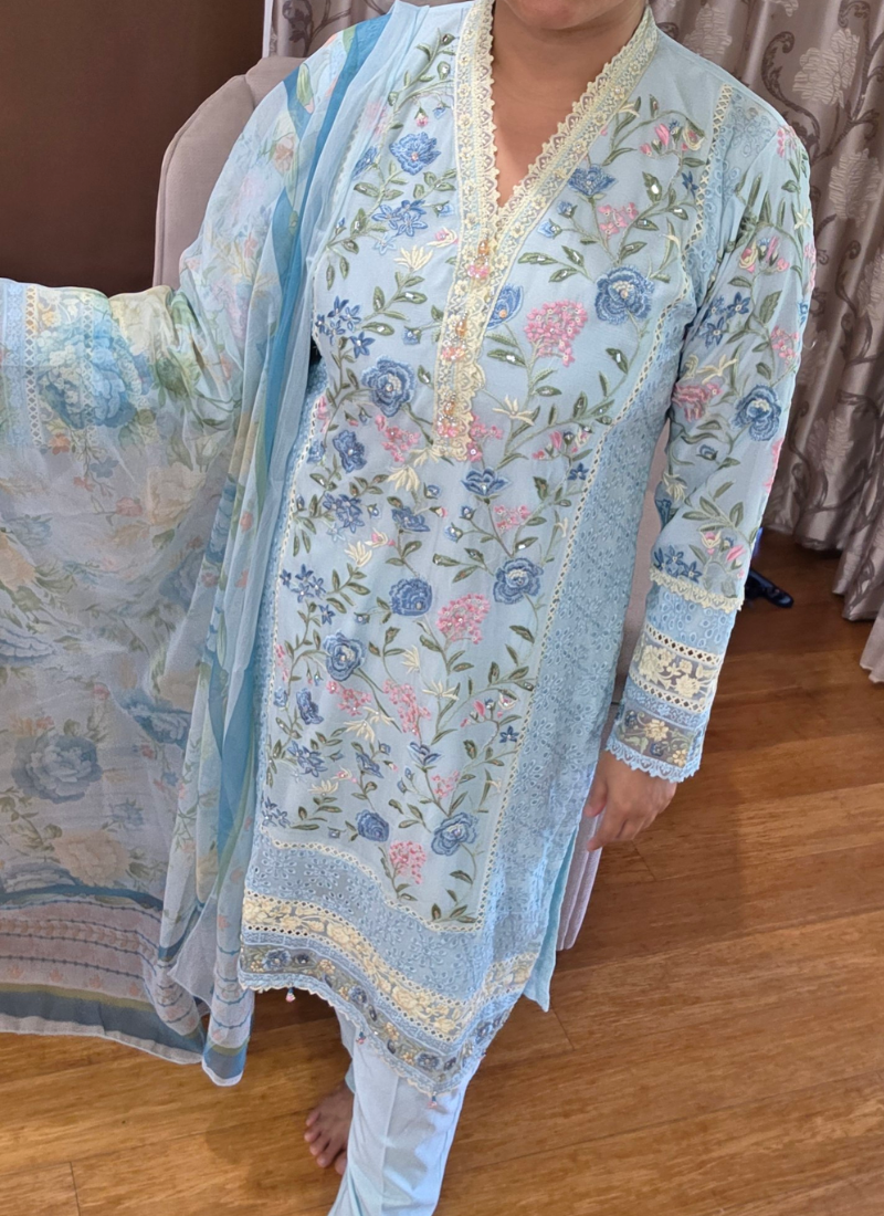 Luxury bridal salwar kameez suit with chiffon kameez, satin salwar, georgette dupatta, and handwork embellishments.