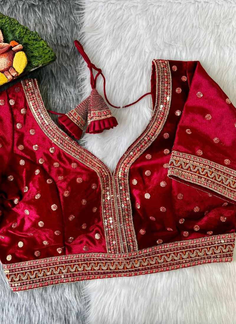 Women’s velvet bridal blouse with heavy embroidery, padded fit, back open style, and festive design.