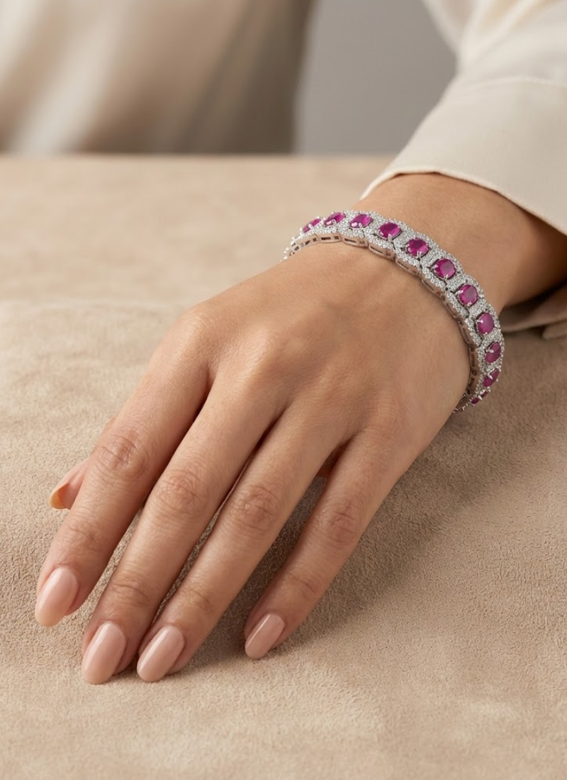 Diamond cut necklace and earring set with premium blue stone centerpiece, bridal jewelry in silver finish.