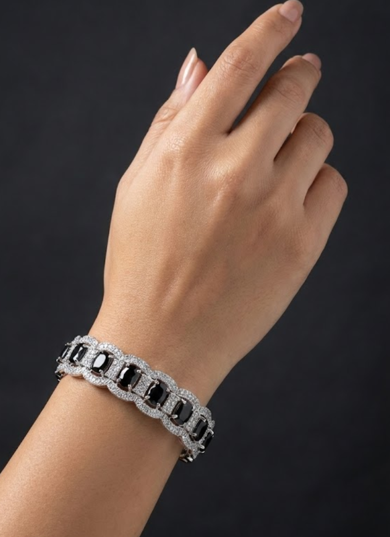 Diamond cut stone bracelet for women with white and black accents, bridal jewelry in silver finish.