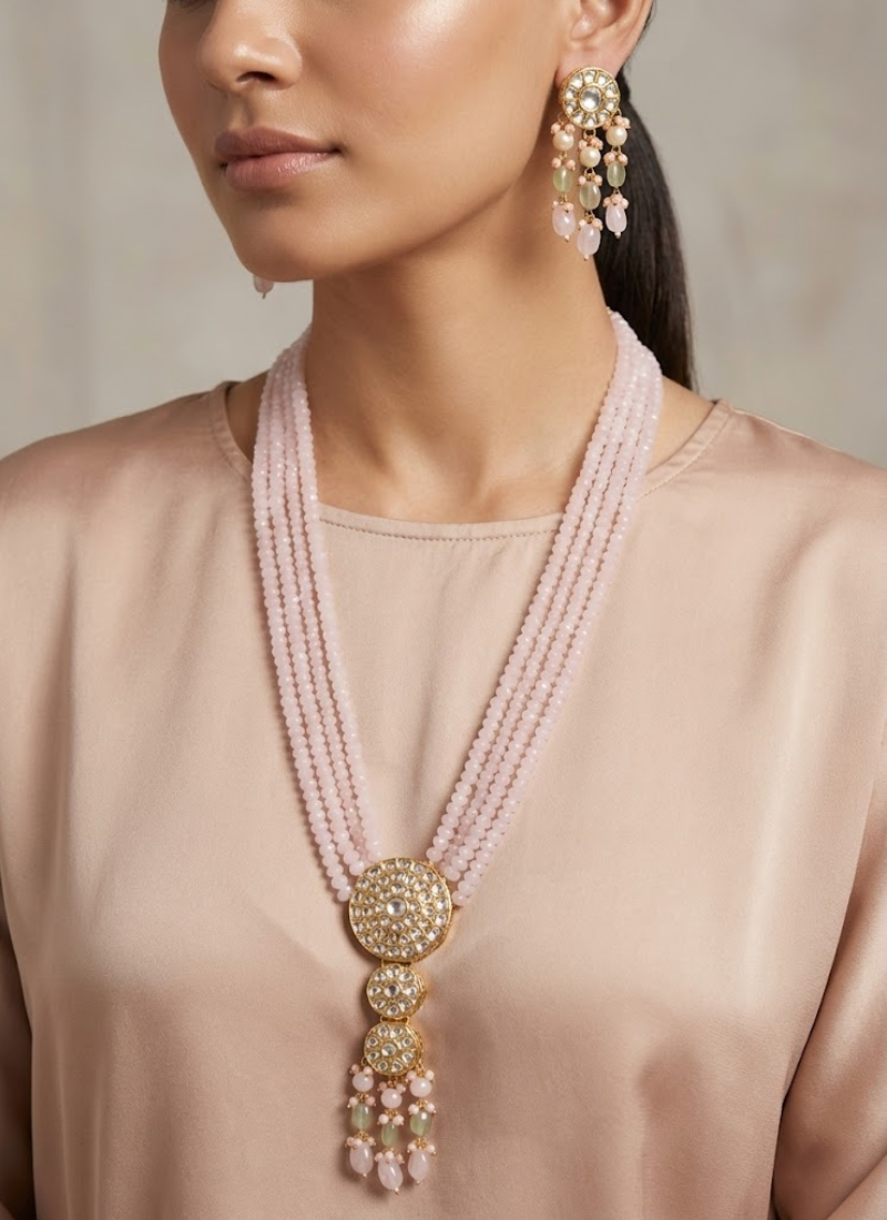 Luxury kundan long necklace with earrings, stone setting and soft pink beads, perfect for weddings and festive occasions.