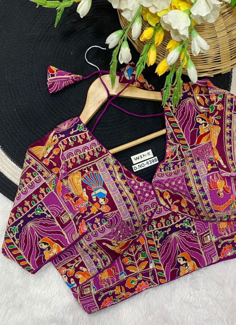 Heavy velvet partywear blouse with Indo cotton lining, premium padding, and half sleeves.