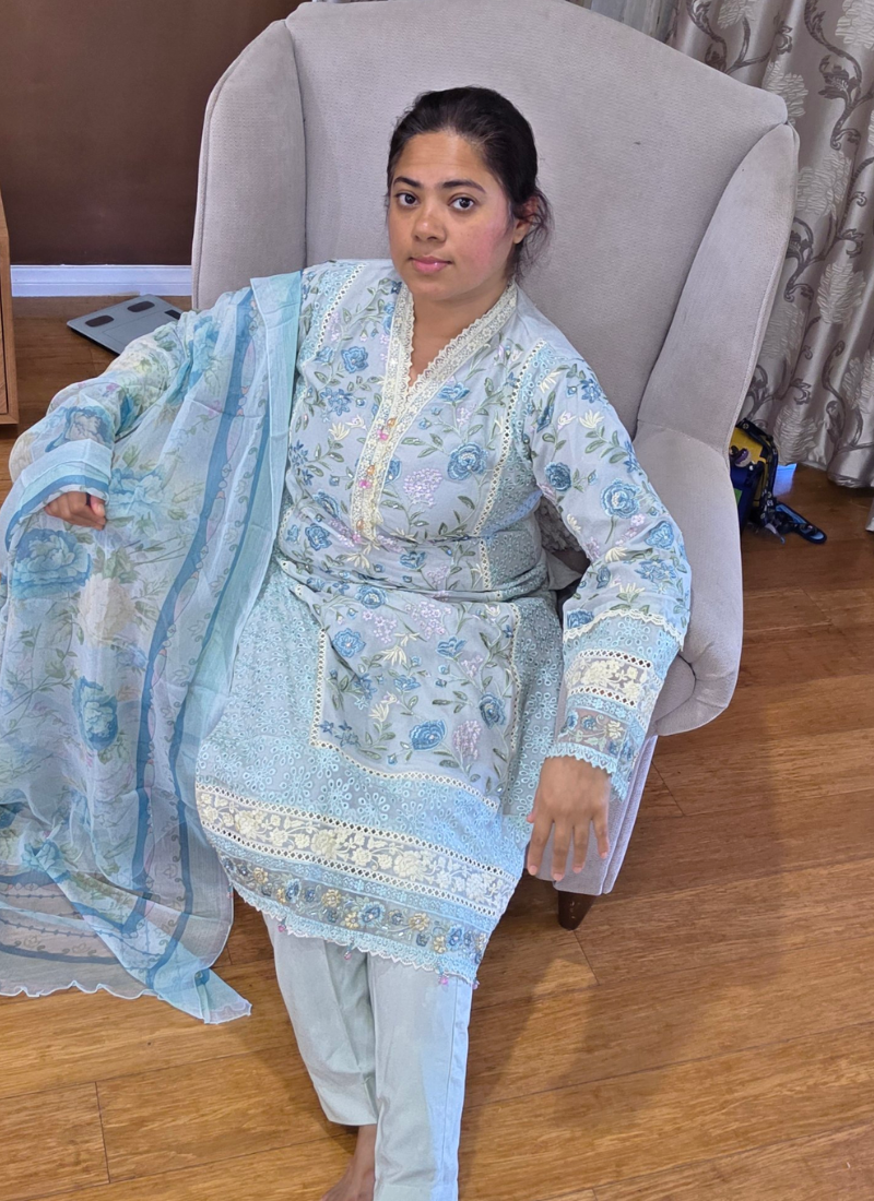 Light ash pest chiffon salwar kameez with satin salwar, georgette dupatta, embroidery, tassels, and lace work.