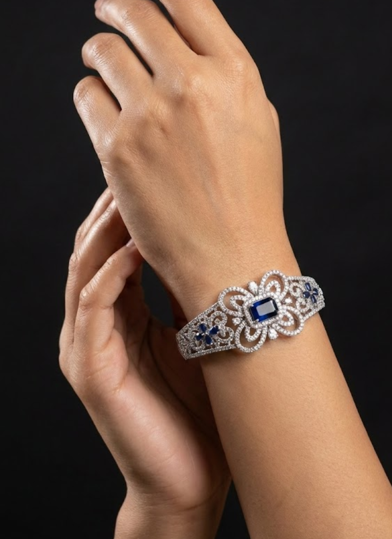 Elegant bracelet design featuring diamond cut stones with black and white setting, partywear jewelry for women.