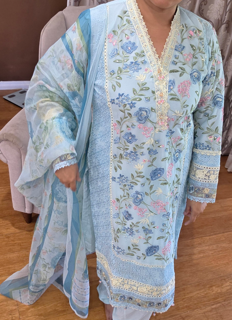 Elegant Indian salwar kameez in light pest chiffon with chikankari detailing and premium embroidery.