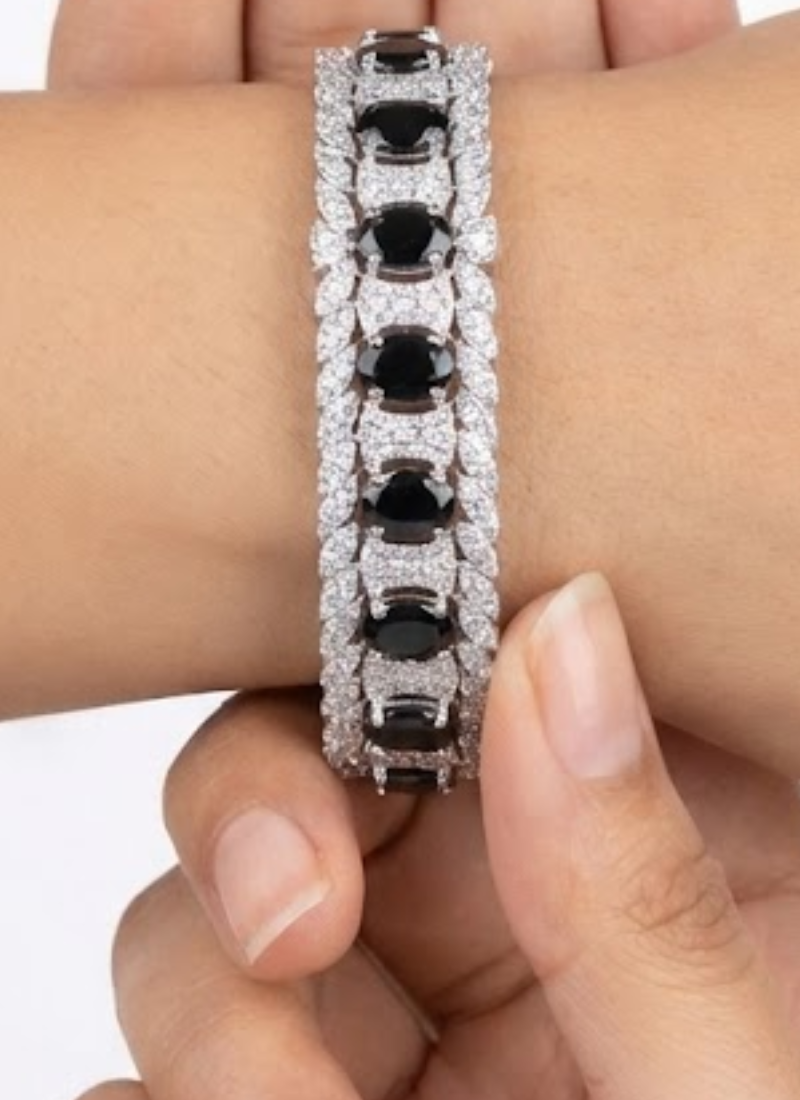 Elegant bracelet design featuring diamond cut stones with black and white setting, partywear jewelry for women.