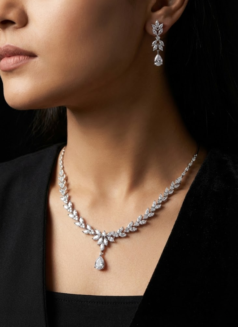 Luxury diamond cut necklace and earring set with high‑quality stone setting, perfect for weddings.