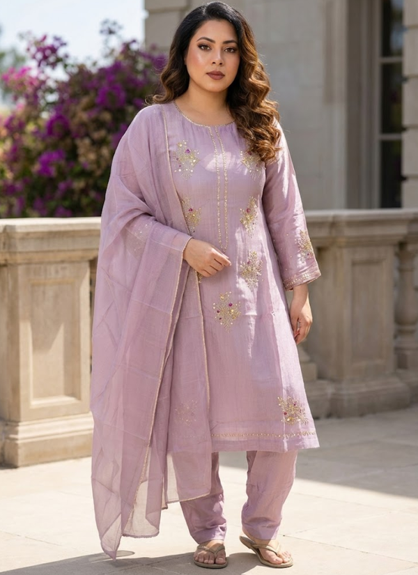 Elegant Indian salwar kameez in light onion pink silk fabric, handcrafted embroidery with zari and sequence.