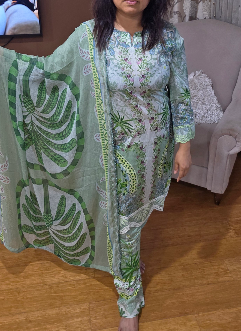 Luxury salwar kameez suit with lawn cotton kameez and salwar, chiffon dupatta, and festive embroidery.