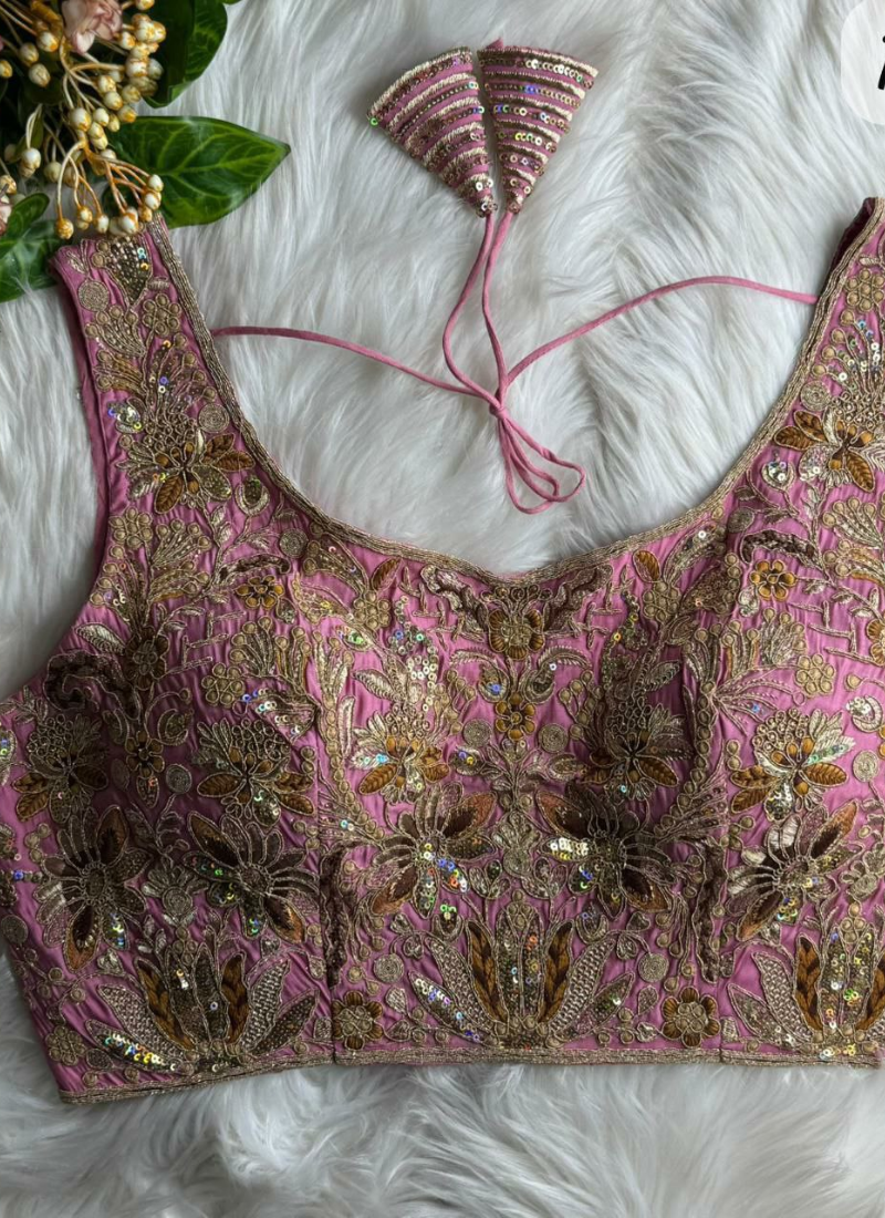 Luxury bridal blouse with velvet fabric, padded fit, cotton lining, and trendy sleeveless cut.