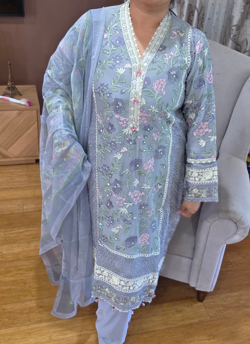 Luxury bridal salwar kameez suit with chiffon kameez, satin salwar, georgette dupatta, and handwork embellishments.