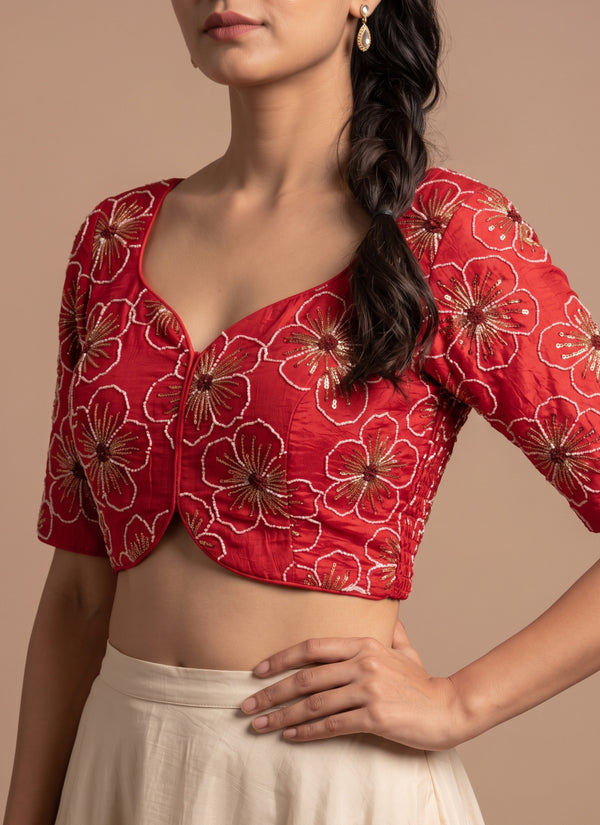 Close-up of the red blouse bead outline flowers, sweetheart neck and plain elbow sleeve