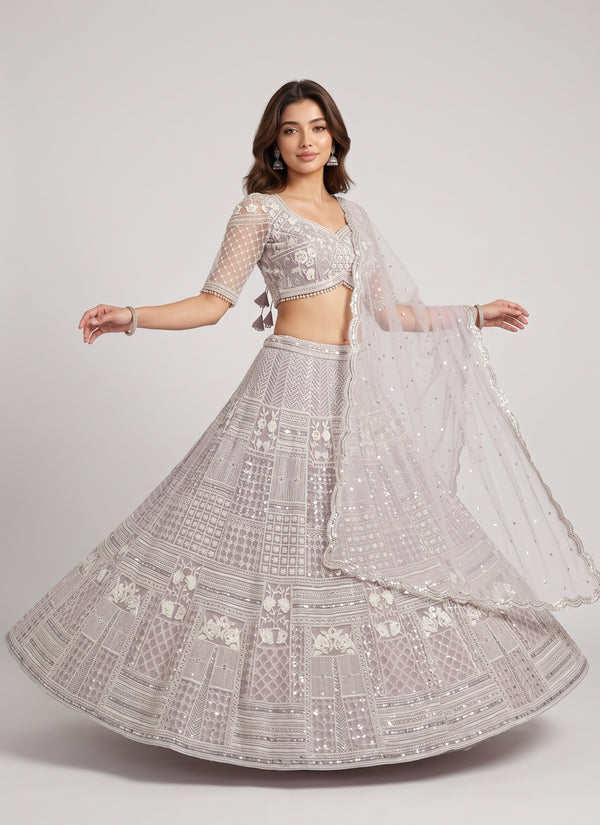 Diwali lilac net lehenga front twirl with net dupatta