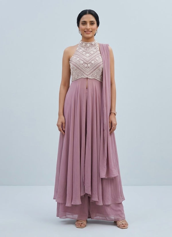 Pink halter neck palazzo set in mauve georgette with pearl embroidered bodice and draped dupatta, front view